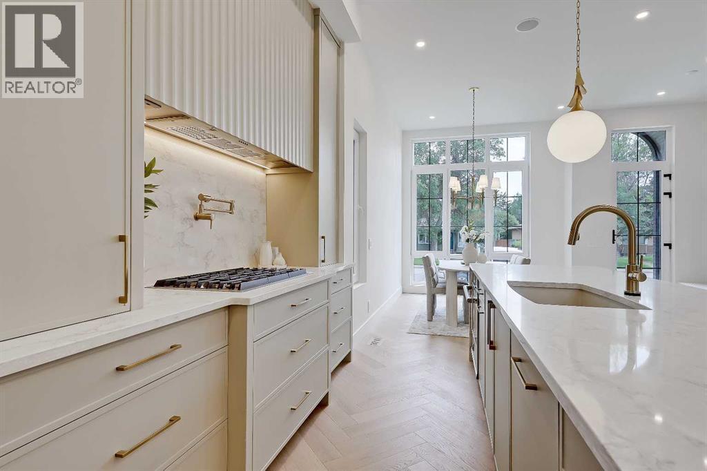 2322 54 Avenue Sw, Calgary, AB - Indoor Photo Showing Kitchen With Upgraded Kitchen