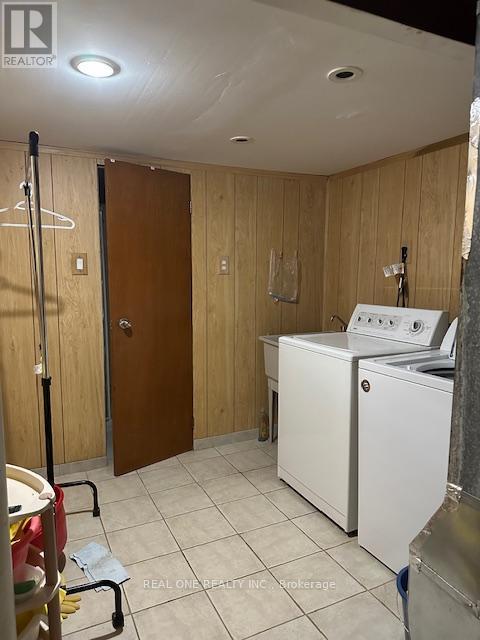 Basement - 334 Chester Le Boulevard, Toronto, ON - Indoor Photo Showing Laundry Room