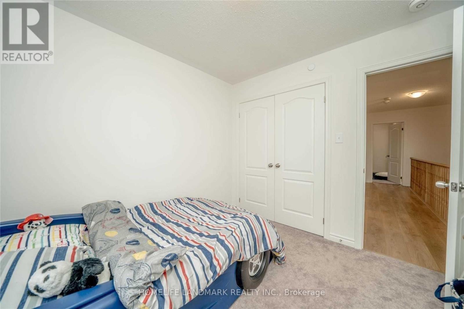 411 - 2218 Chevron Prince Path, Oshawa, ON - Indoor Photo Showing Bedroom