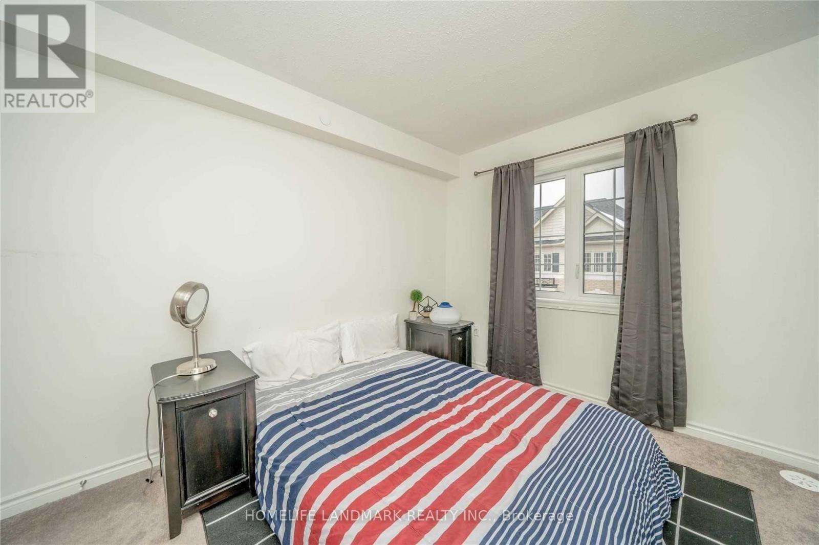 411 - 2218 Chevron Prince Path, Oshawa, ON - Indoor Photo Showing Bedroom