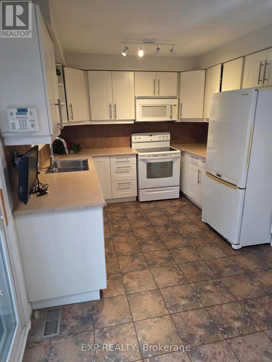 1296 Valerie Crescent W, Oakville, ON - Indoor Photo Showing Kitchen With Double Sink