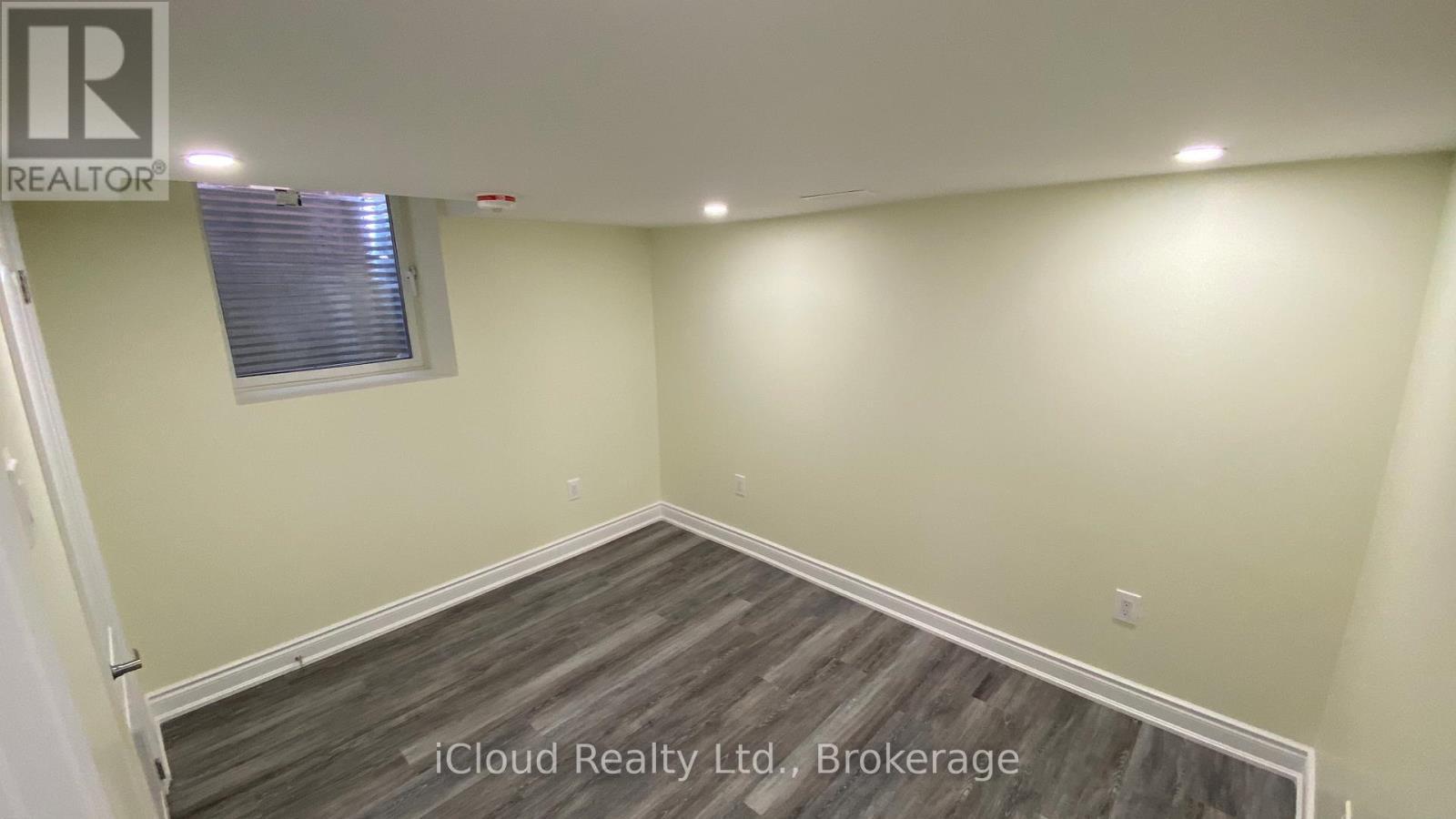 Second Bedroom - Huge Window - Basement - 1198 Mceachern Court, Milton, ON - Indoor Photo Showing Other Room