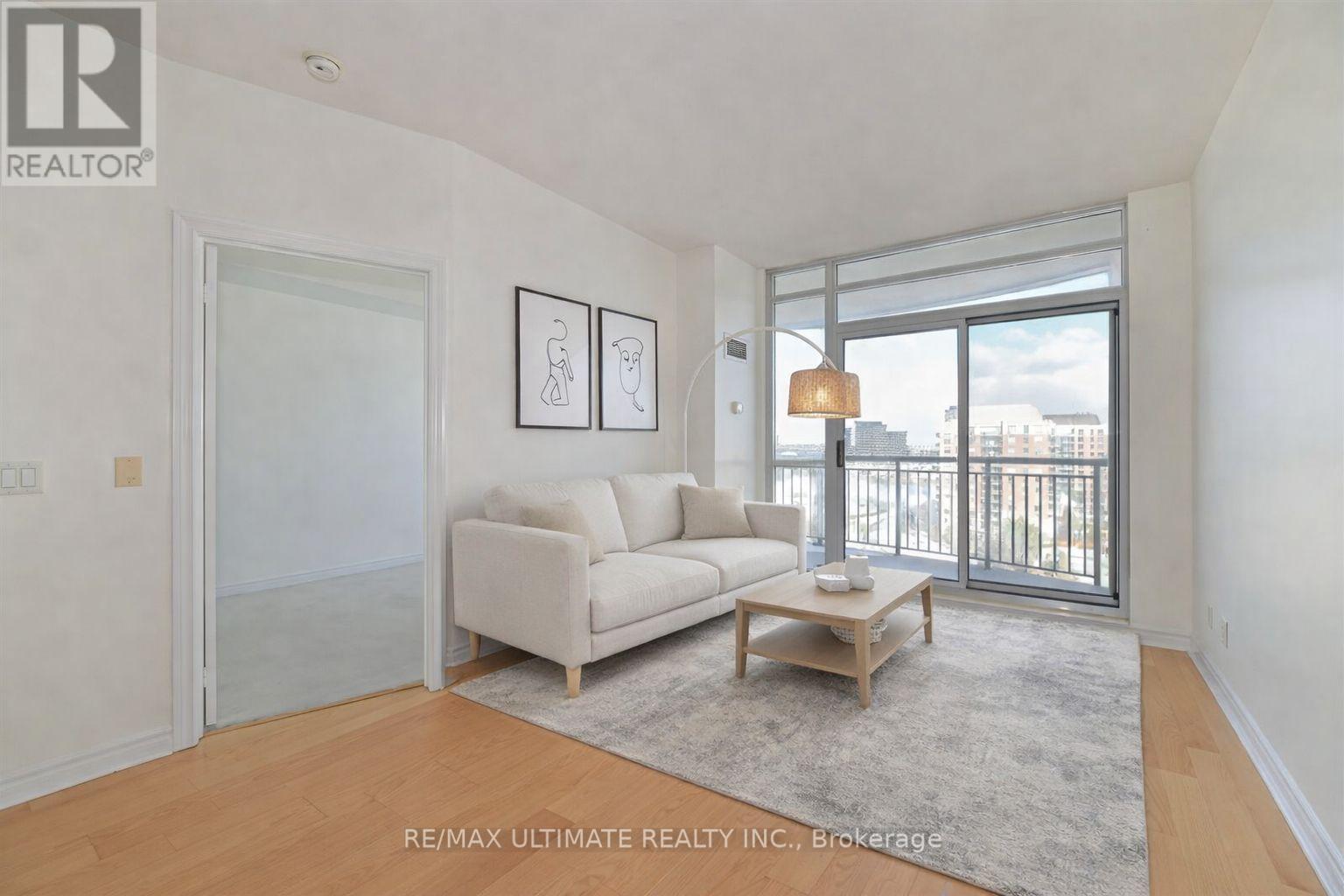 1104 - 2325 Central Park Drive, Oakville, ON - Indoor Photo Showing Living Room