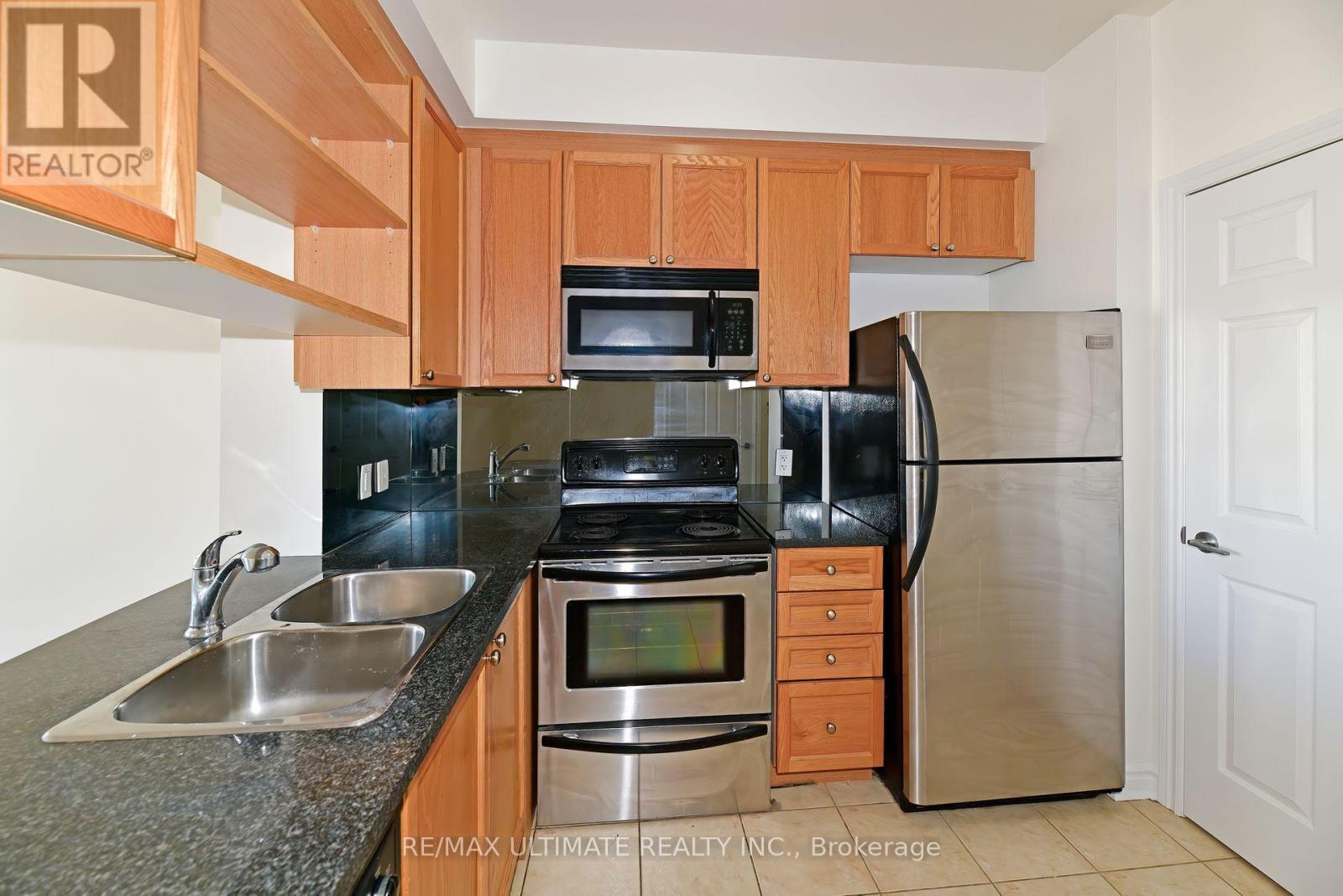 1104 - 2325 Central Park Drive, Oakville, ON - Indoor Photo Showing Kitchen With Double Sink