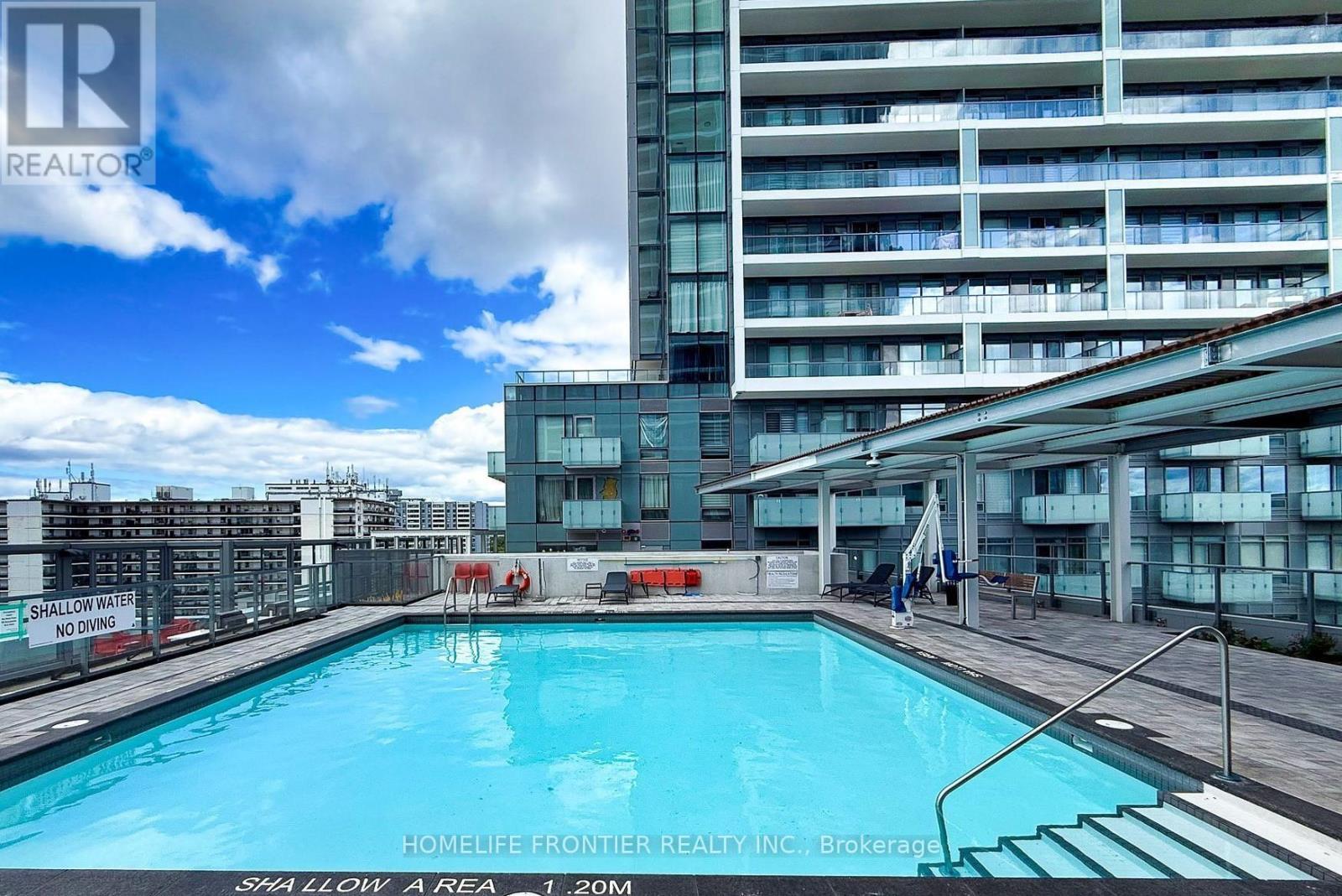 S1103 - 8 Olympic Garden Drive, Toronto, ON - Outdoor With In Ground Pool With Balcony