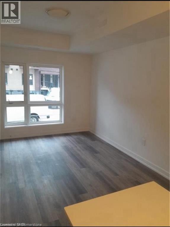 Other angle of bedroom when vacant - 20 Palace Street Unit# G10, Kitchener, ON - Indoor Photo Showing Other Room