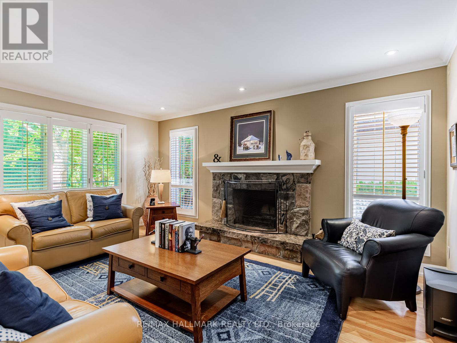 Cozy family room with a fireplace - 88 Ames Circle, Toronto, ON - Indoor Photo Showing Living Room With Fireplace