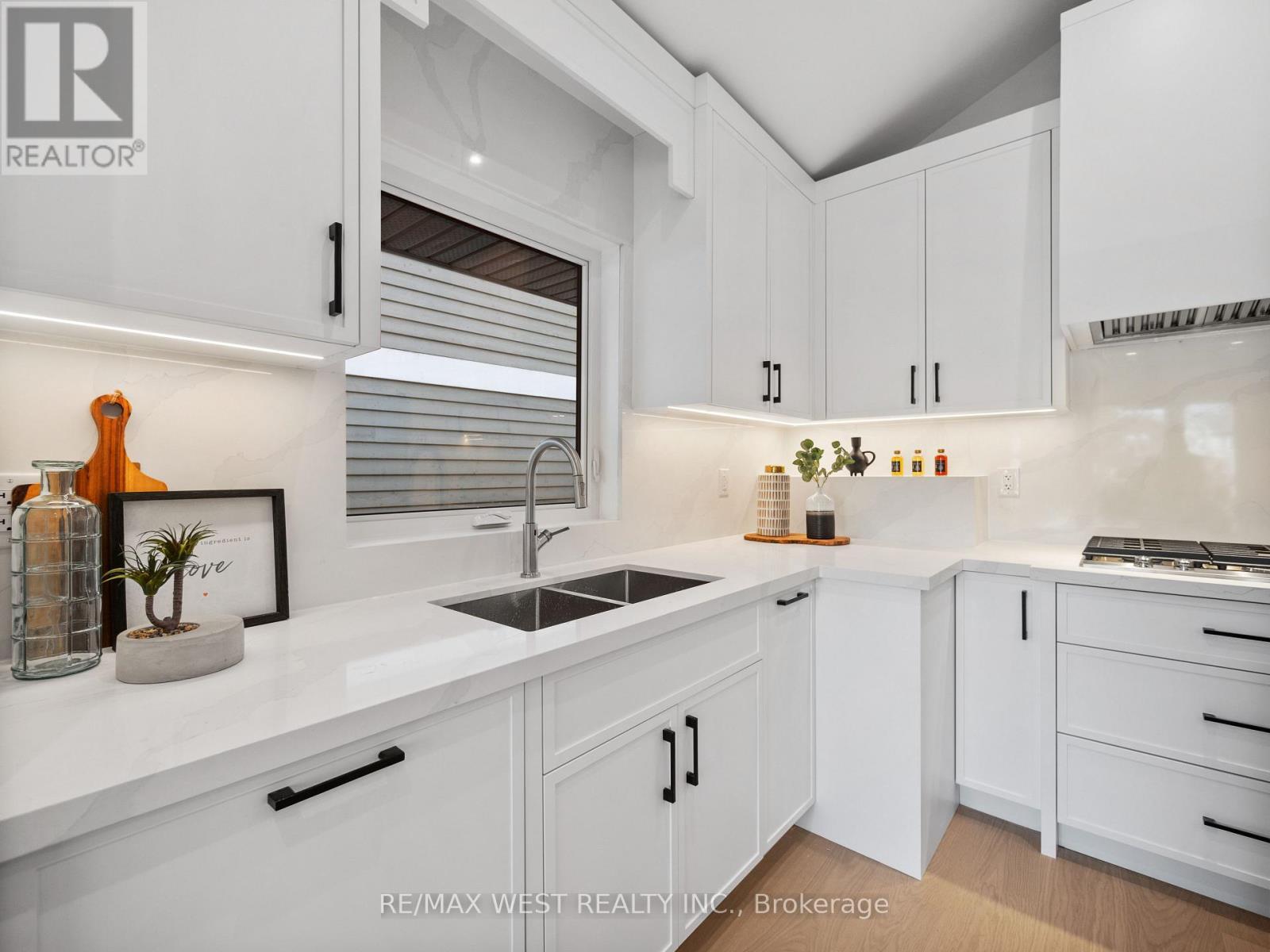 24 Appledale Road, Toronto, ON - Indoor Photo Showing Kitchen With Double Sink