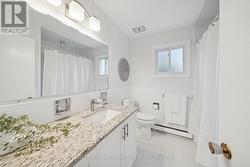 Updated main bath with granite countertop -
