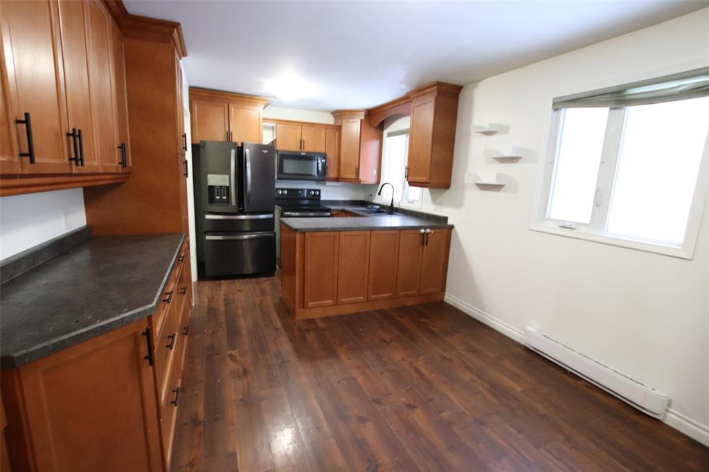 43 Williams Street, The Pas, MB - Indoor Photo Showing Kitchen With Double Sink