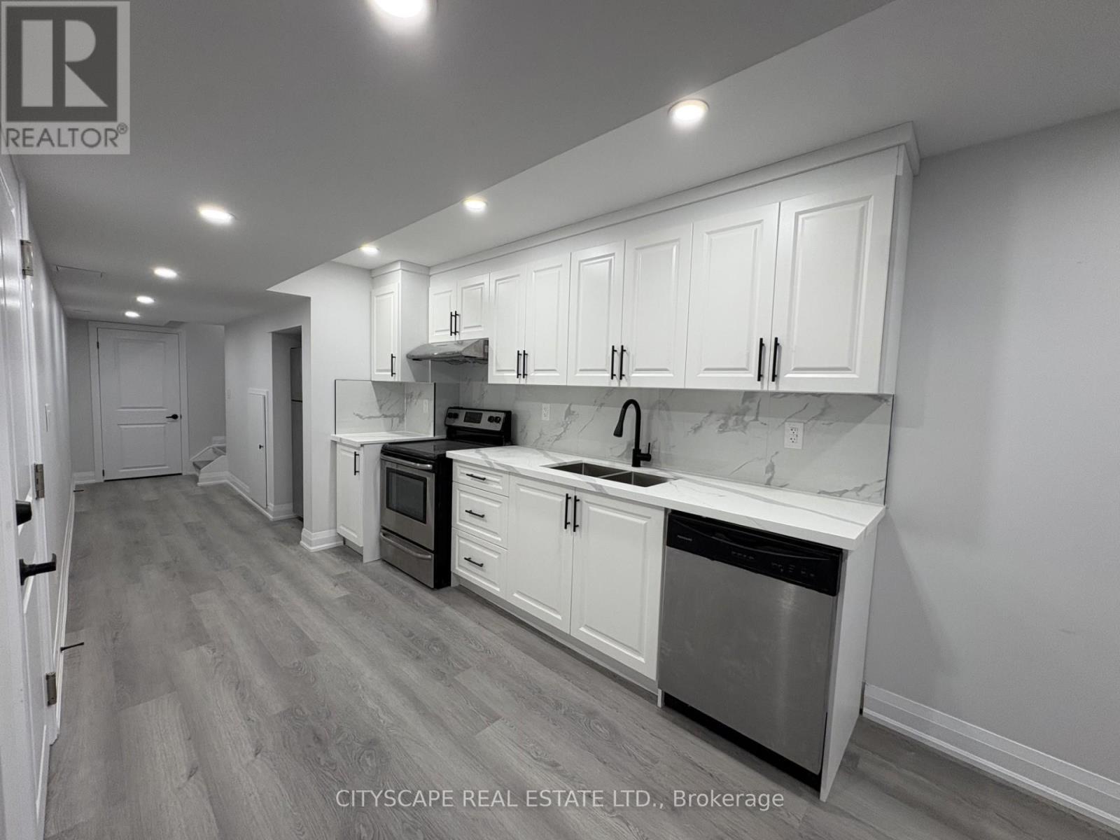 Basement - 5517 Meadowcrest Avenue, Mississauga, ON - Indoor Photo Showing Kitchen With Double Sink