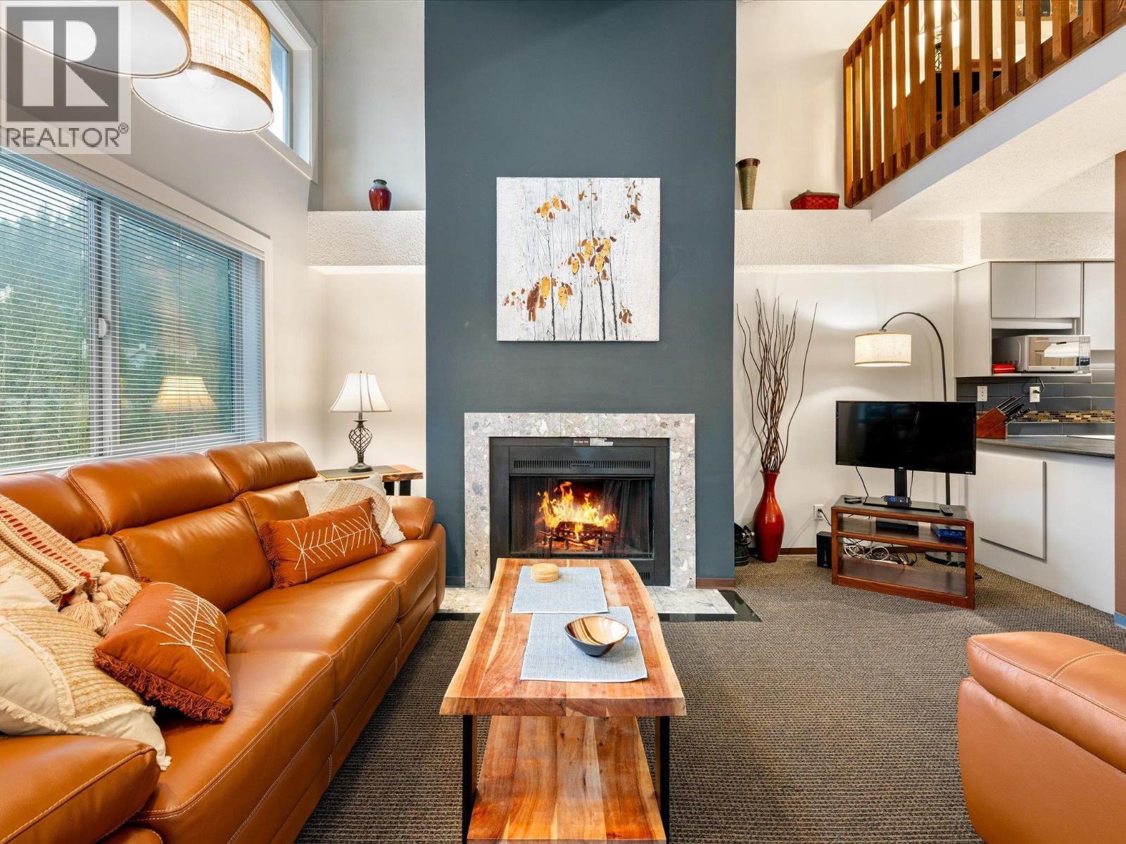320 2021 Karen Crescent, Whistler, BC - Indoor Photo Showing Living Room With Fireplace