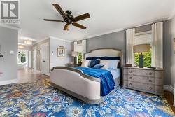 Primary lakeview bedroom. Walk-in closet & bathrm -