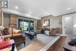 Family room with walkout. Gym/bed 2 at door. -