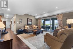 Family room with walkout. Den door end of hall. -