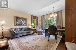 Den at end of hall -