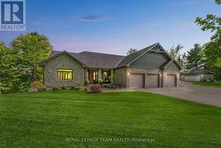 3 Car attached garage and detached double garage -