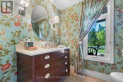 Powder room at main entrance -
