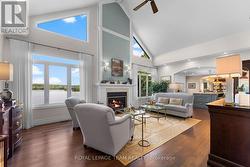 Vaulted ceiling with fireplace, open to kitchen -