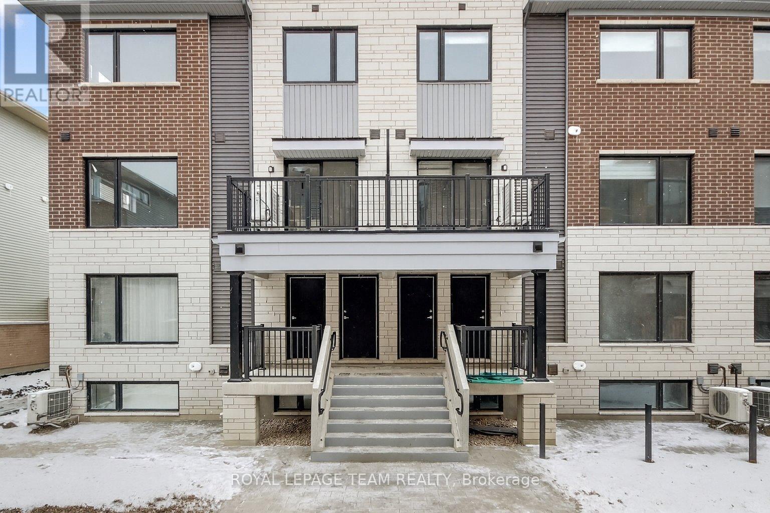 18 - 301 Glenroy Gilbert Drive N, Ottawa, ON - Outdoor With Balcony With Facade