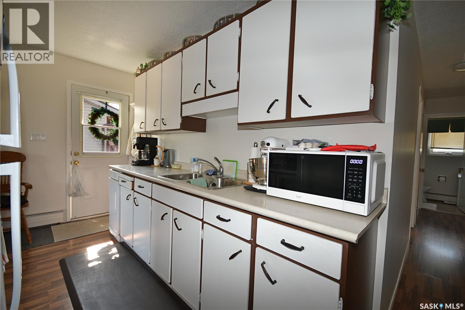 110 7Th Avenue S, Big River, SK - Indoor Photo Showing Kitchen With Double Sink