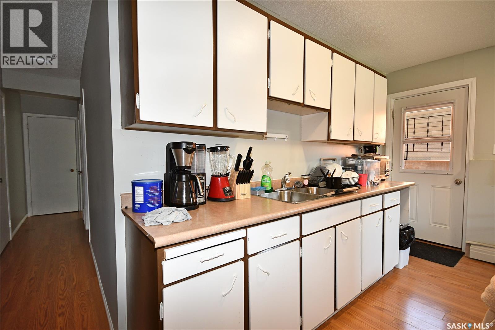 110 7Th Avenue S, Big River, SK - Indoor Photo Showing Kitchen With Double Sink