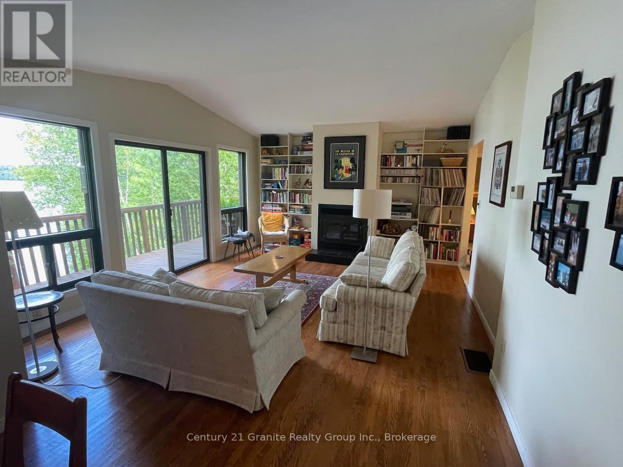 1119 Wampum Road, Dysart Et Al (Dudley), ON - Indoor Photo Showing Living Room With Fireplace