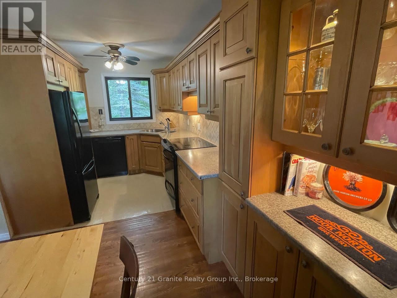 1119 Wampum Road, Dysart Et Al (Dudley), ON - Indoor Photo Showing Kitchen With Double Sink