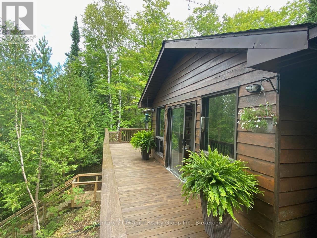 1119 Wampum Road, Dysart Et Al (Dudley), ON - Outdoor With Deck Patio Veranda