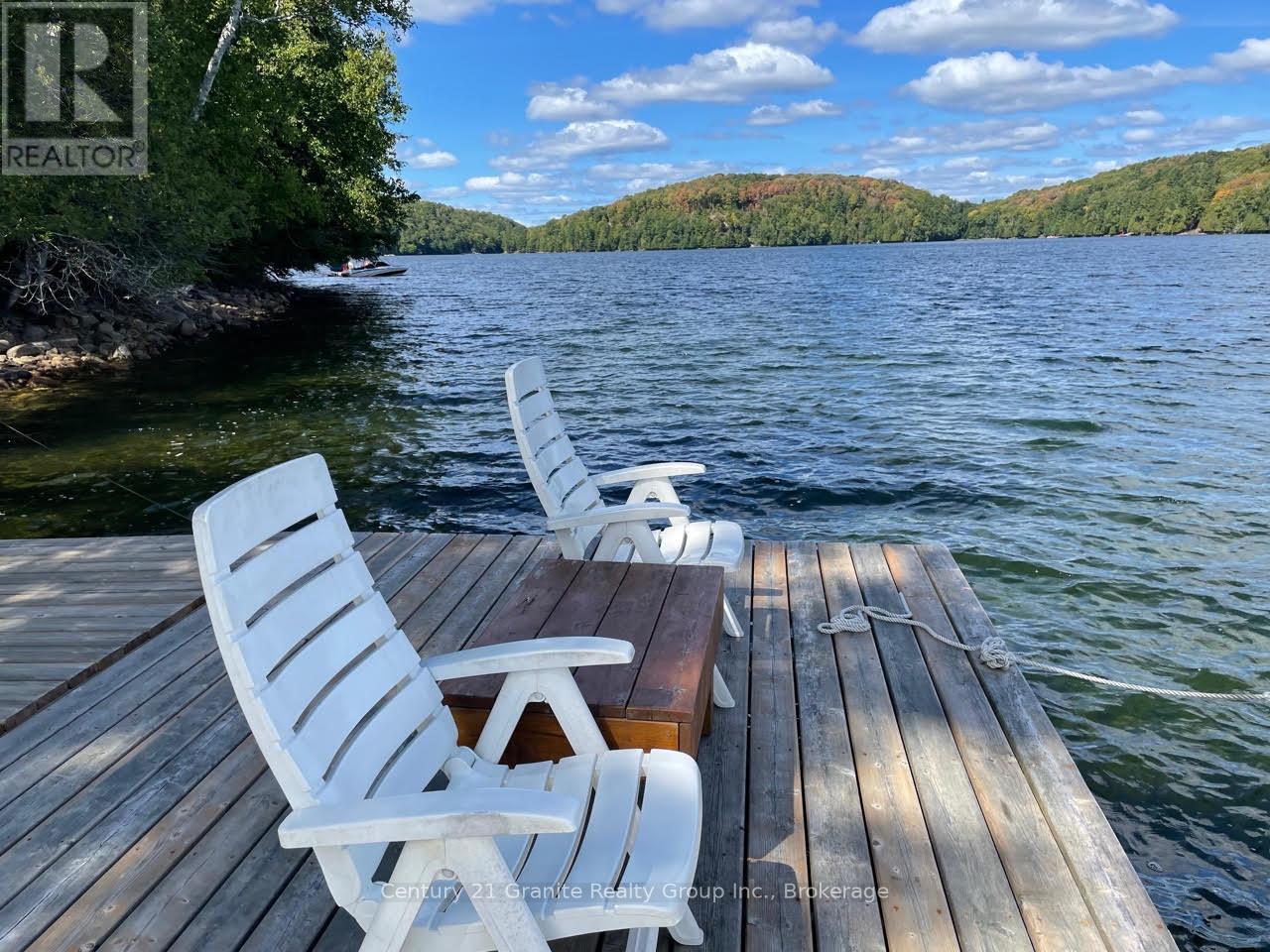 1119 Wampum Road, Dysart Et Al (Dudley), ON - Outdoor With Body Of Water With Deck Patio Veranda With View