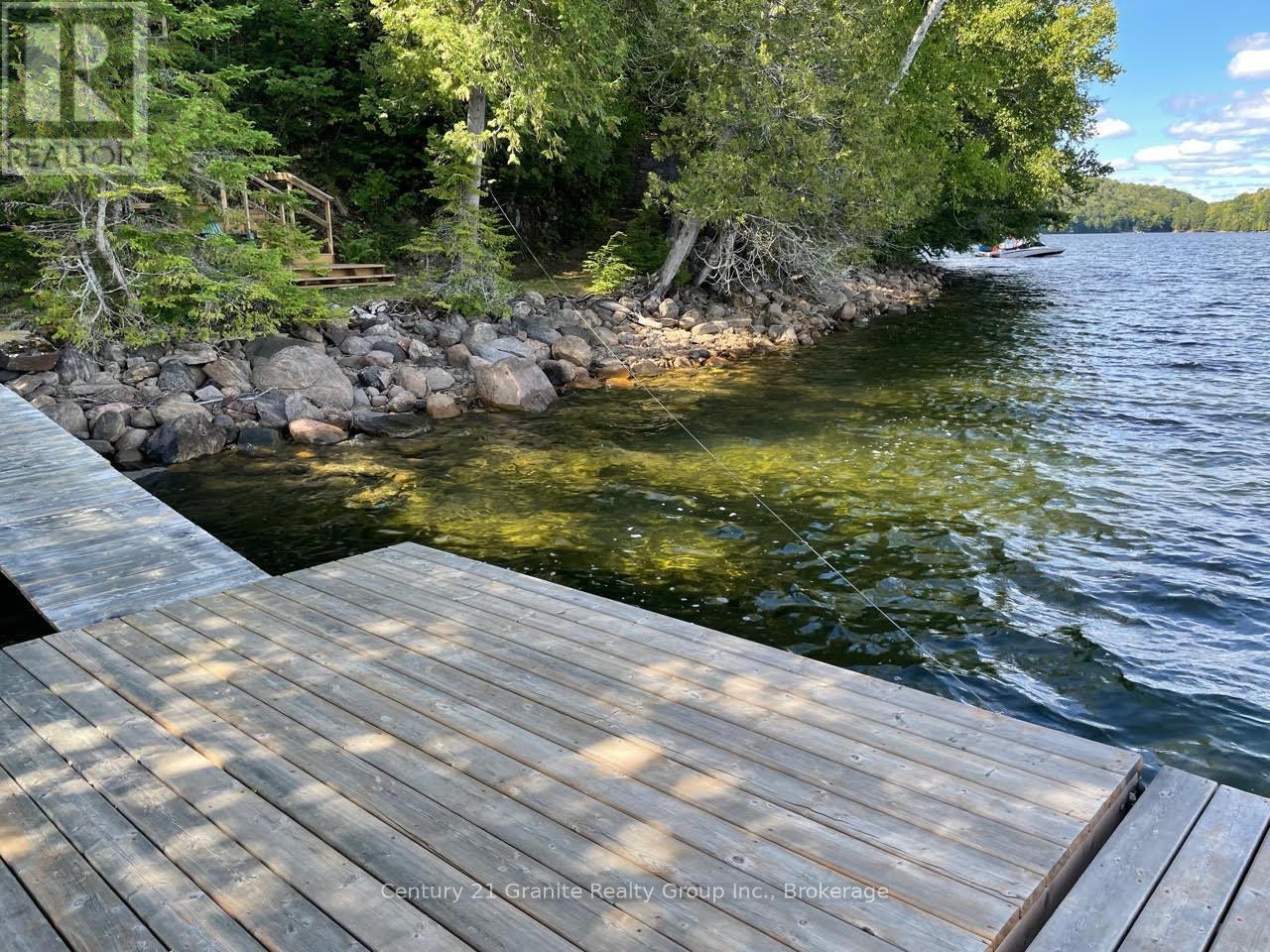 1119 Wampum Road, Dysart Et Al (Dudley), ON - Outdoor With Body Of Water