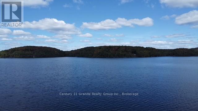 1119 Wampum Road, Dysart Et Al (Dudley), ON - Outdoor With Body Of Water With View