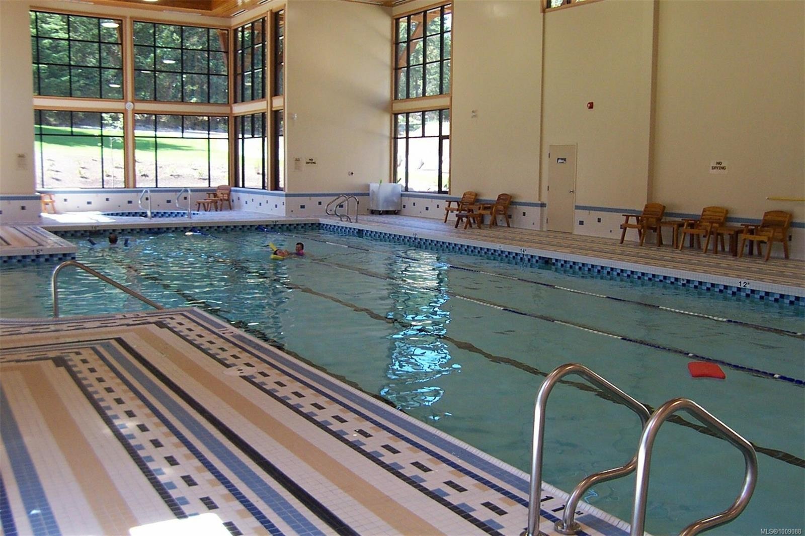 207-3529 Dolphin Dr, Nanoose Bay, BC - Indoor Photo Showing Other Room With In Ground Pool