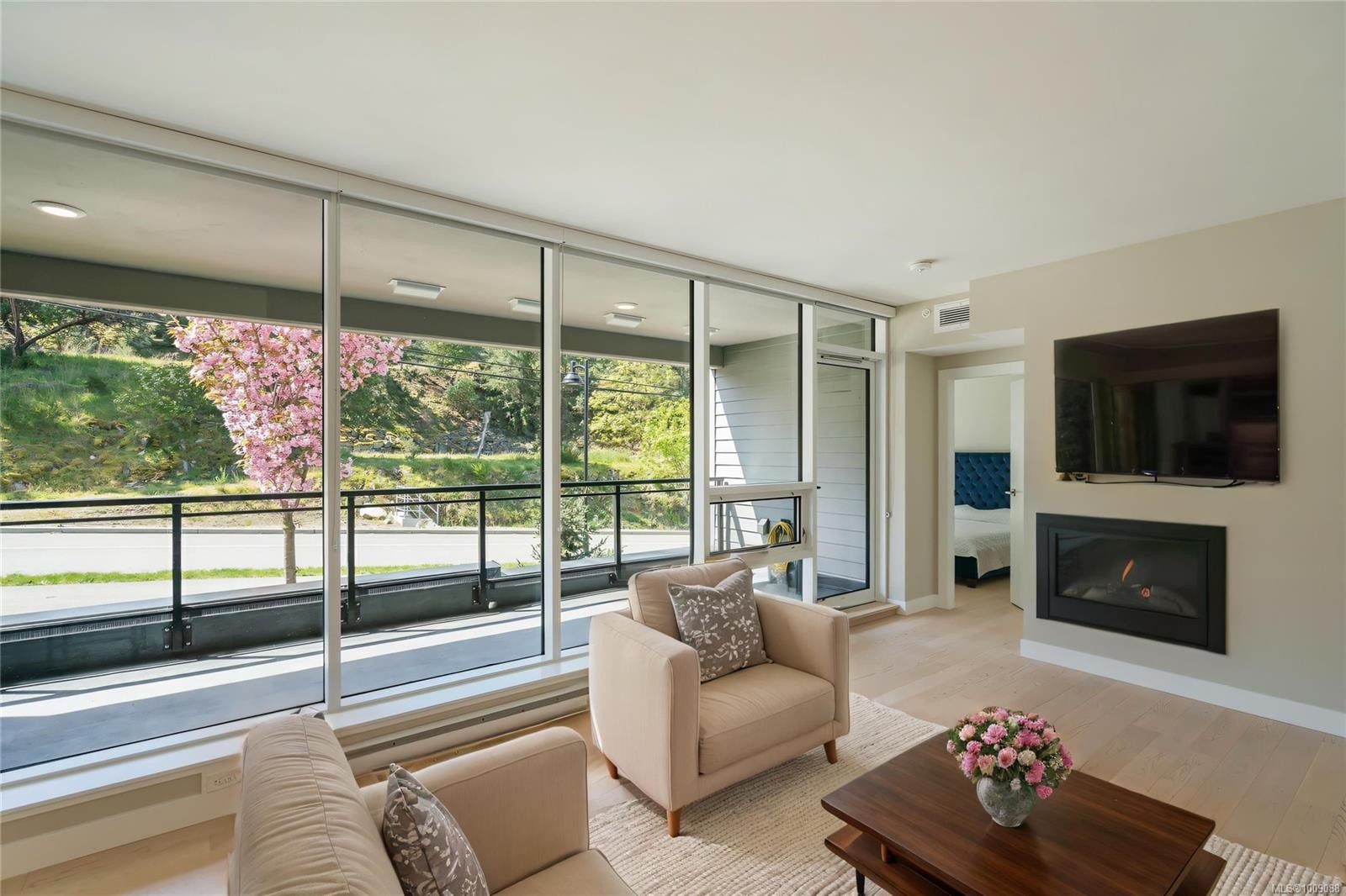 207-3529 Dolphin Dr, Nanoose Bay, BC - Indoor Photo Showing Living Room With Fireplace