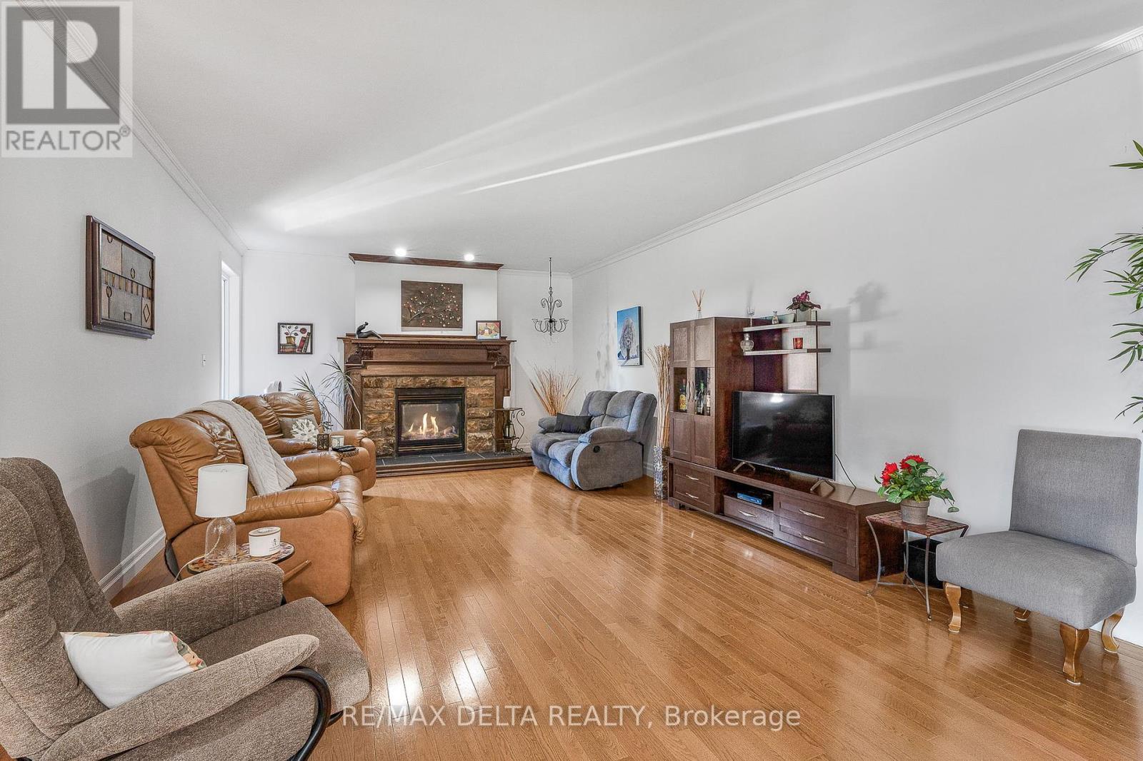 455 Front Road W, Champlain, ON - Indoor Photo Showing Living Room With Fireplace