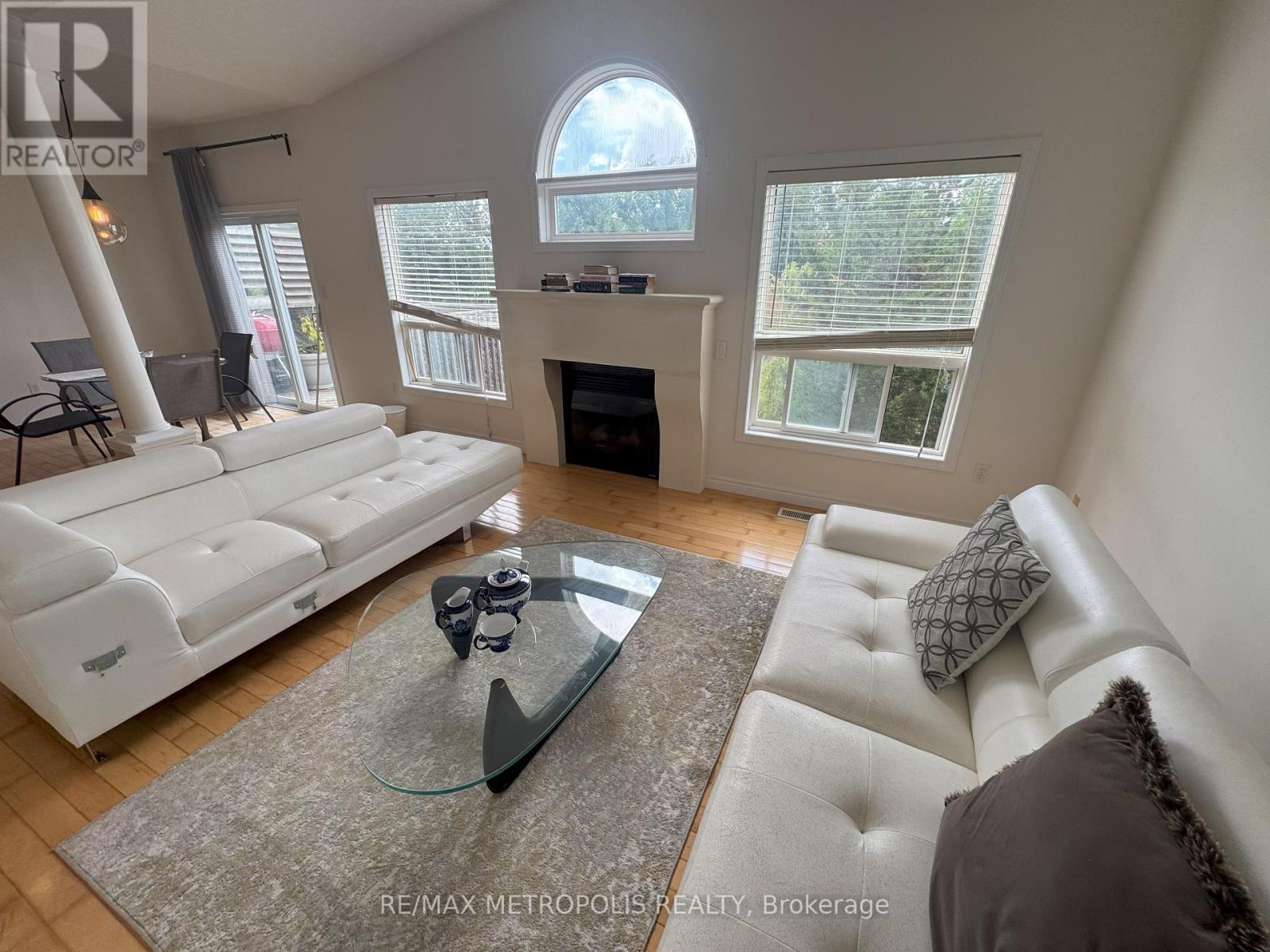Room 1 - 770 Brandenburg Boulevard, Waterloo, ON - Indoor Photo Showing Living Room With Fireplace