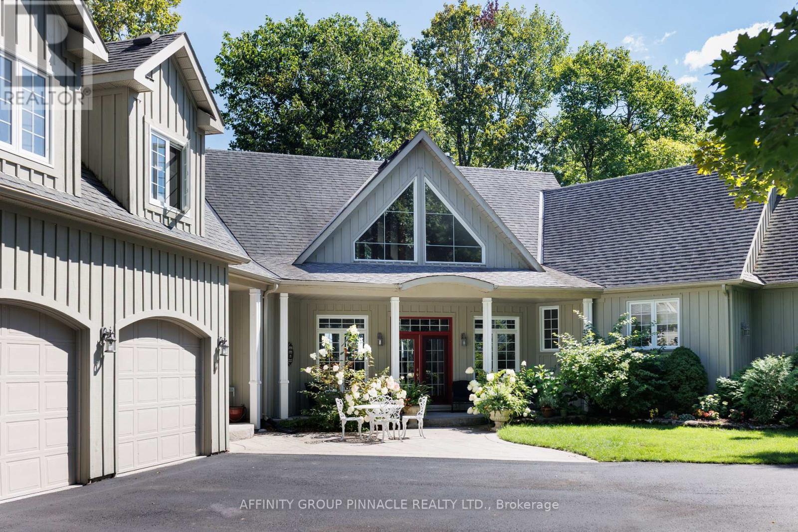 12 Edgewood Drive, Kawartha Lakes (Verulam), ON - Outdoor With Deck Patio Veranda With Facade