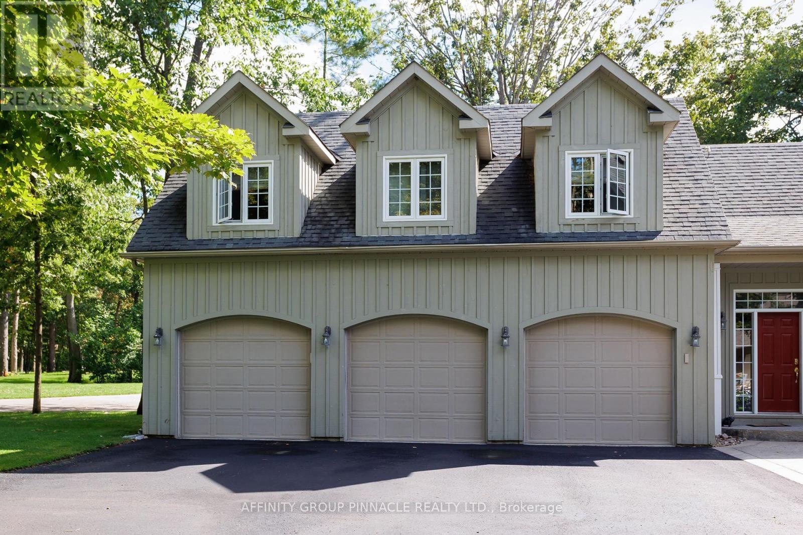 12 Edgewood Drive, Kawartha Lakes (Verulam), ON - Outdoor With Facade