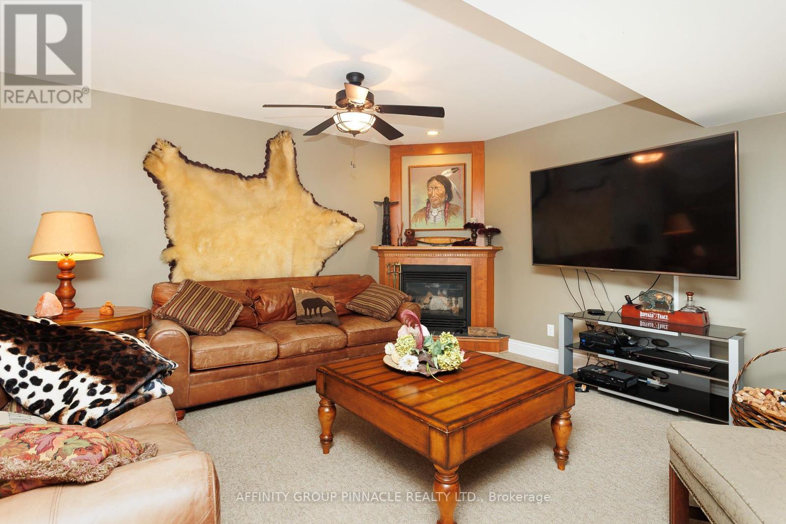 12 Edgewood Drive, Kawartha Lakes (Verulam), ON - Indoor Photo Showing Living Room With Fireplace