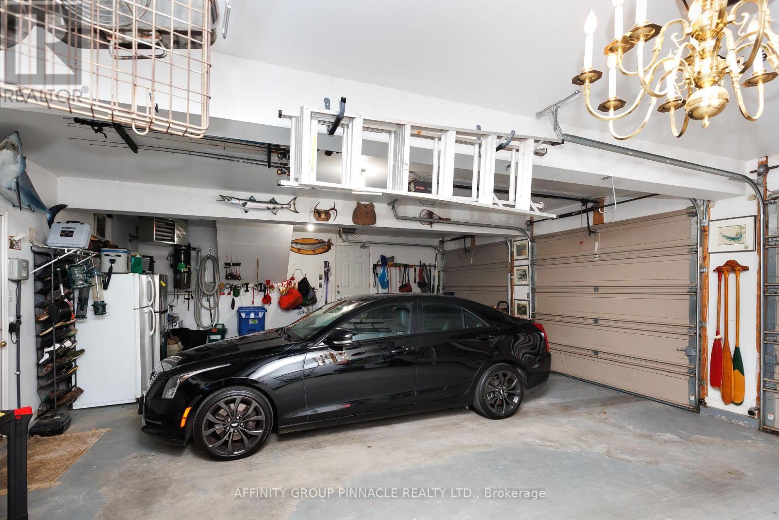 12 Edgewood Drive, Kawartha Lakes (Verulam), ON - Indoor Photo Showing Garage