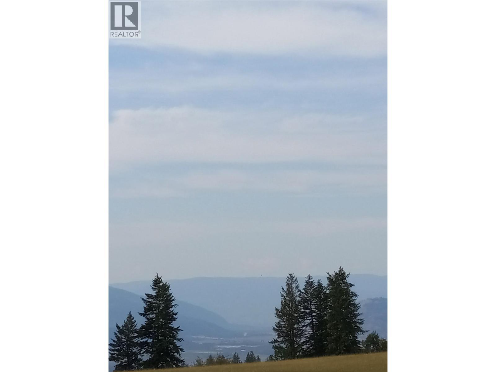 valley view from fence line - Hitchcock Road, Vernon, BC