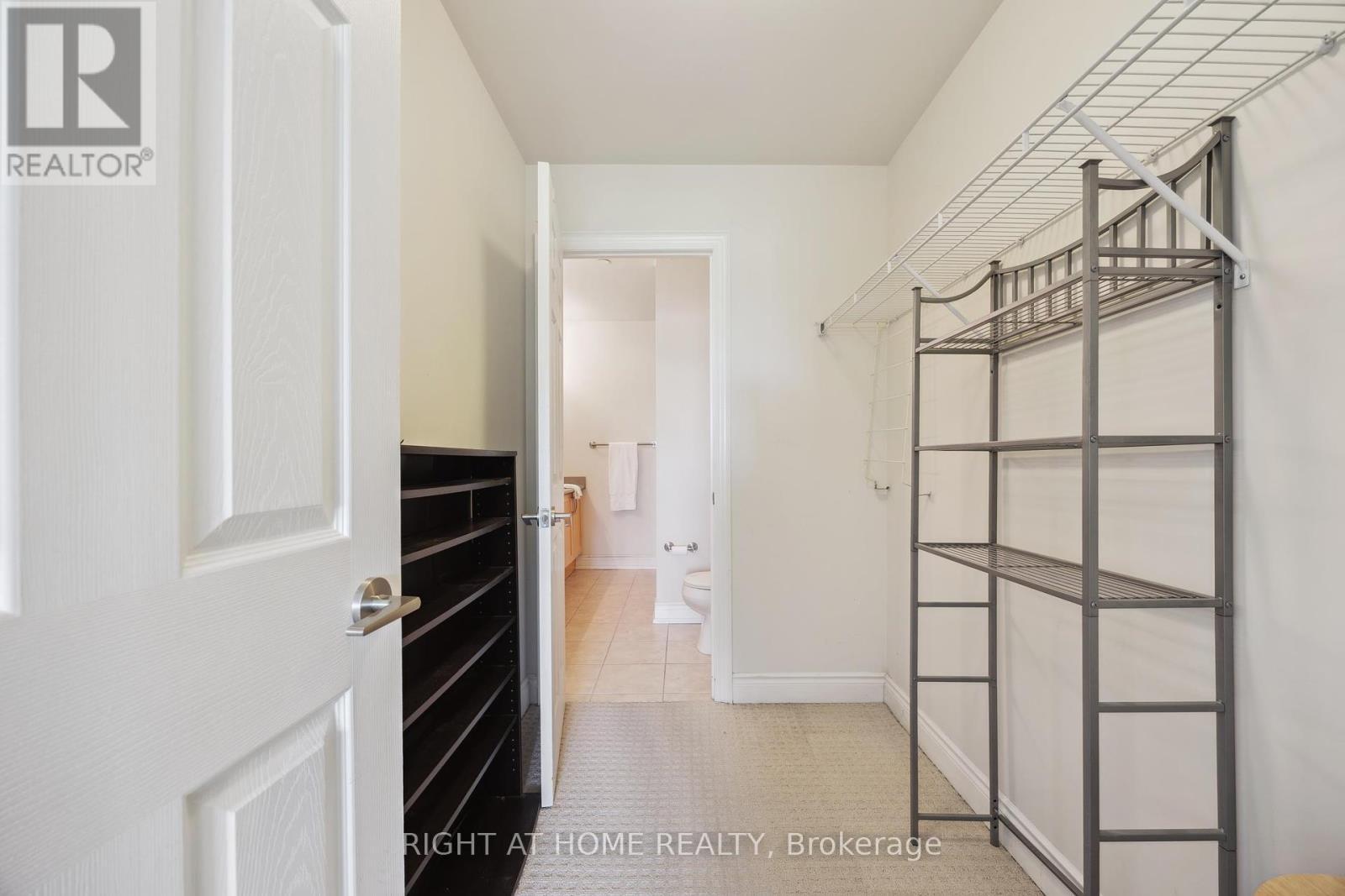 walk in closet - 205 - 171 Shanly Street, Scugog (Port Perry), ON - Indoor Photo Showing Other Room