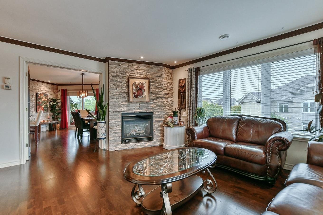 Salon - 106-47 37E Avenue E., Blainville, QC - Indoor Photo Showing Living Room With Fireplace