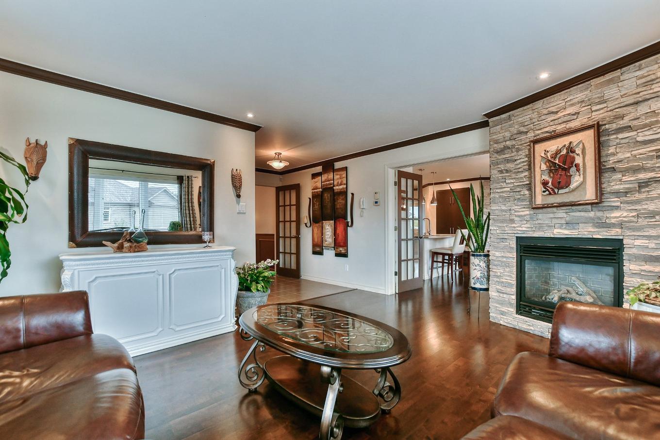 Salon - 106-47 37E Avenue E., Blainville, QC - Indoor Photo Showing Living Room With Fireplace