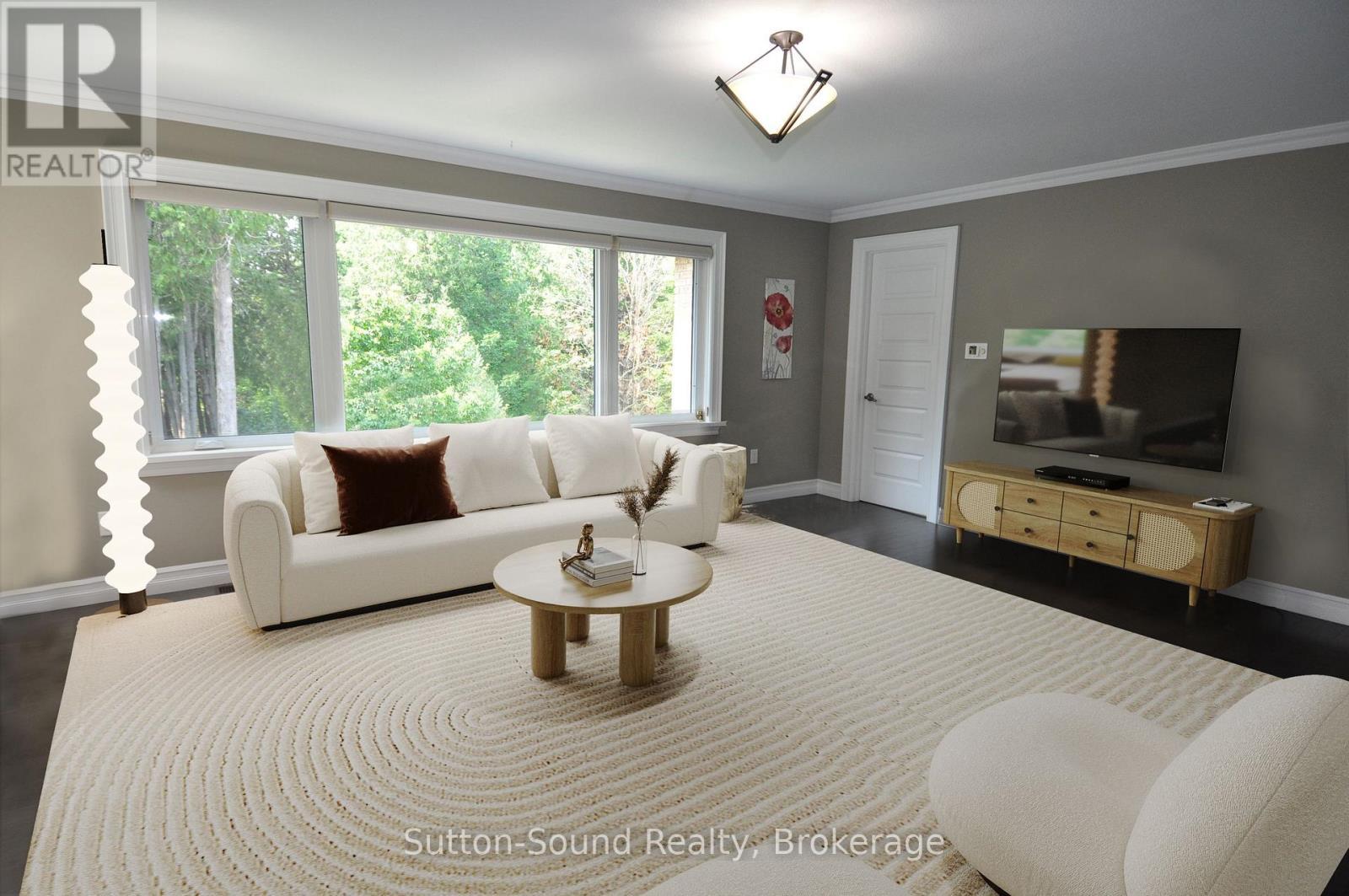 Virtual Staged Master Bed Sitting Area - 318760 Grey Road 1, Georgian Bluffs, ON - Indoor Photo Showing Living Room