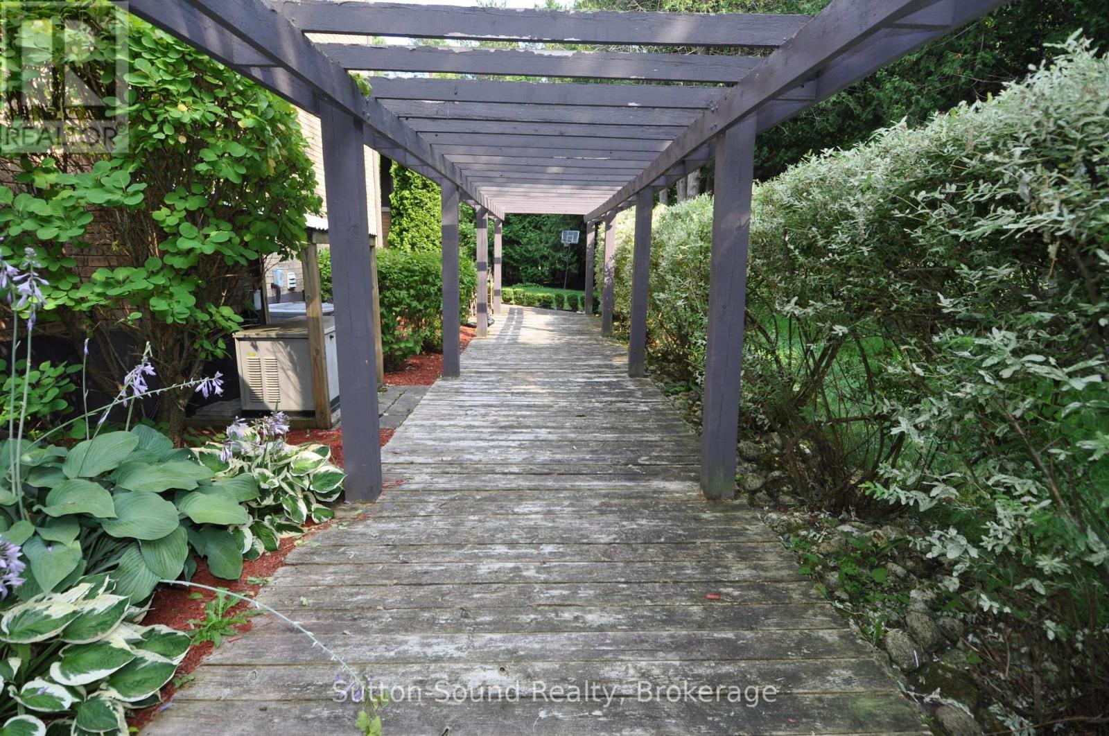 Wonderful walkway at the side of the house - 318760 Grey Road 1, Georgian Bluffs, ON - Outdoor