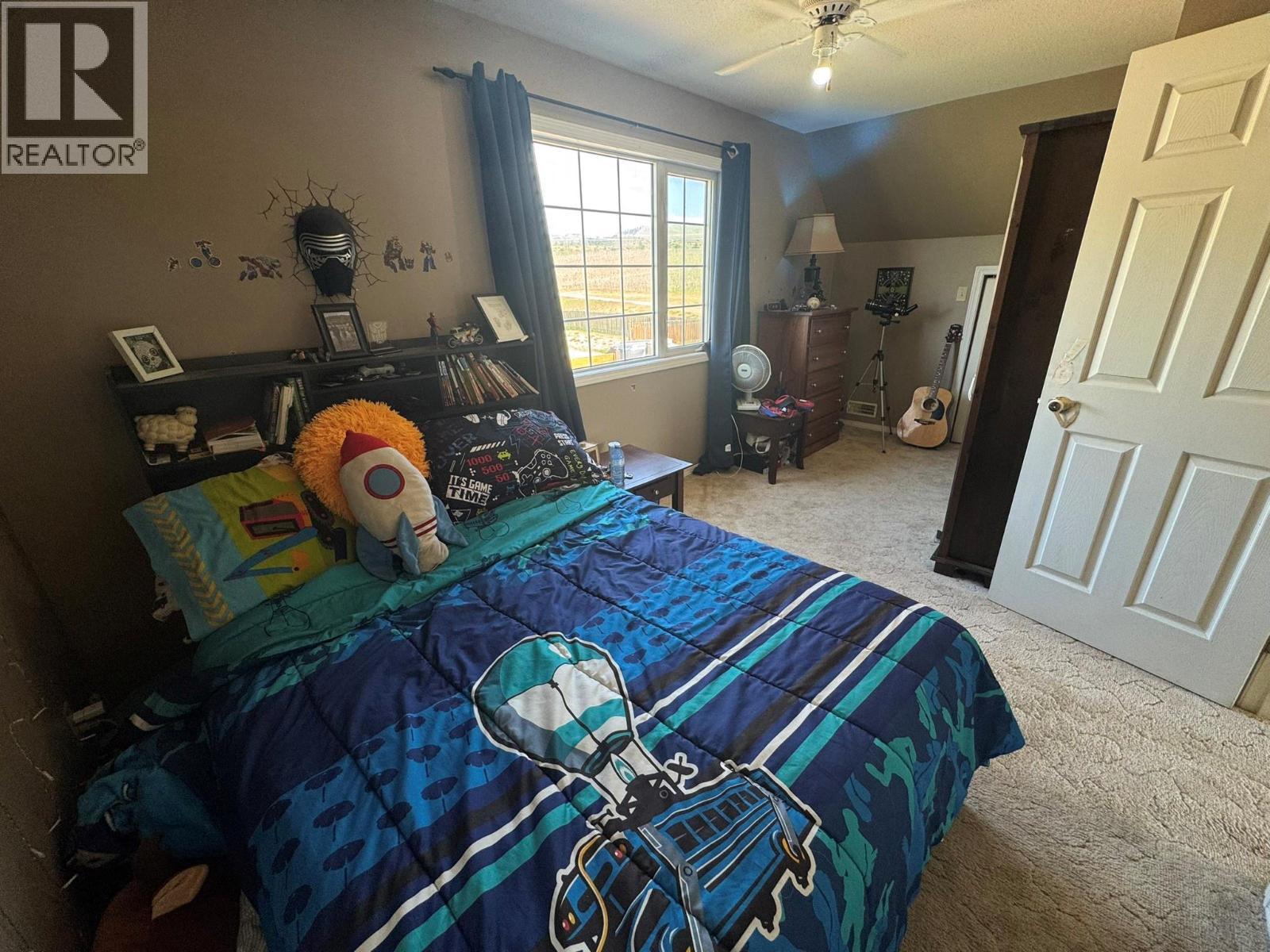 7137 Tucelnuit Drive, Oliver, BC - Indoor Photo Showing Bedroom