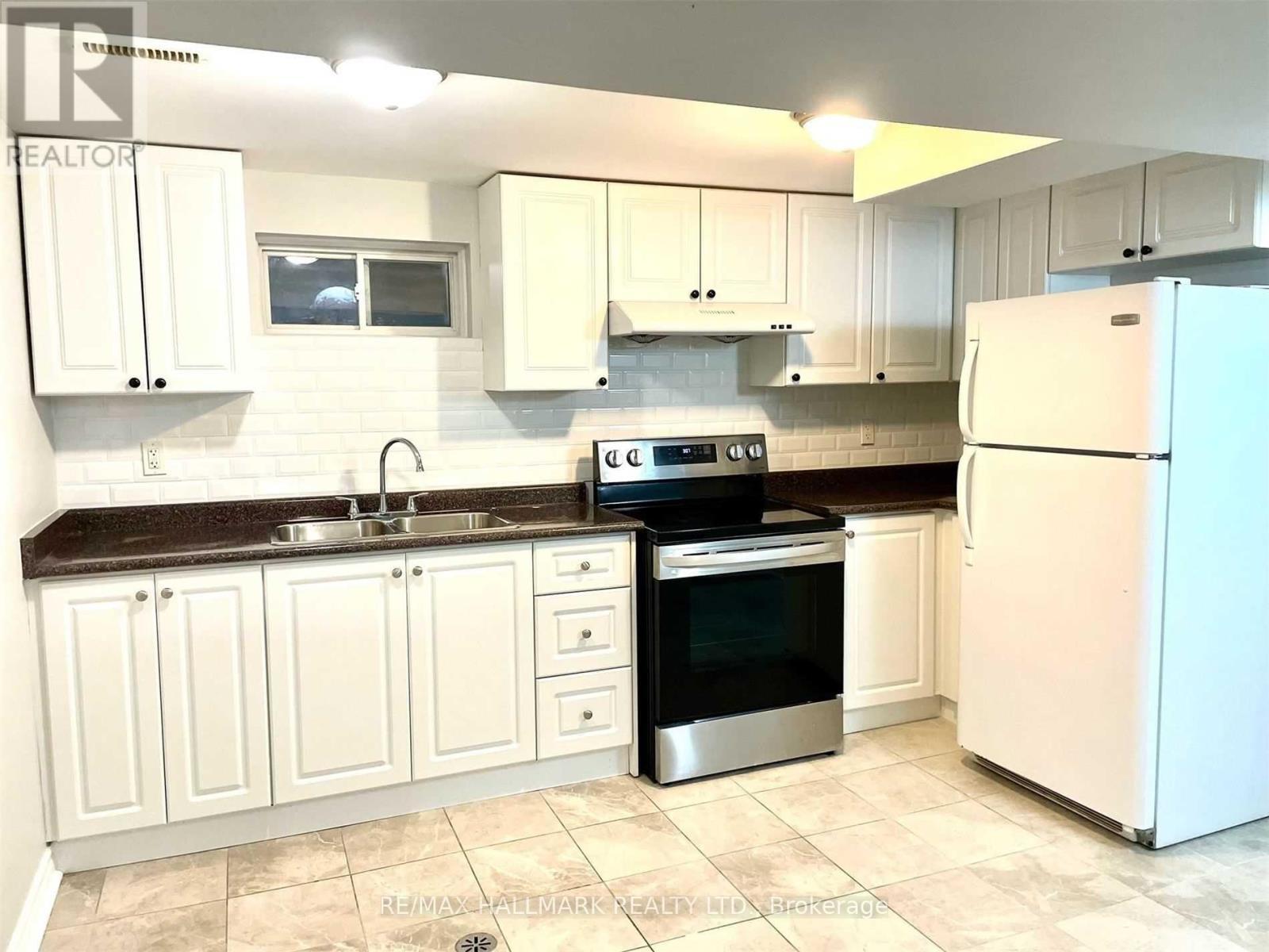 20 Snowball Crescent, Toronto, ON - Indoor Photo Showing Kitchen With Double Sink