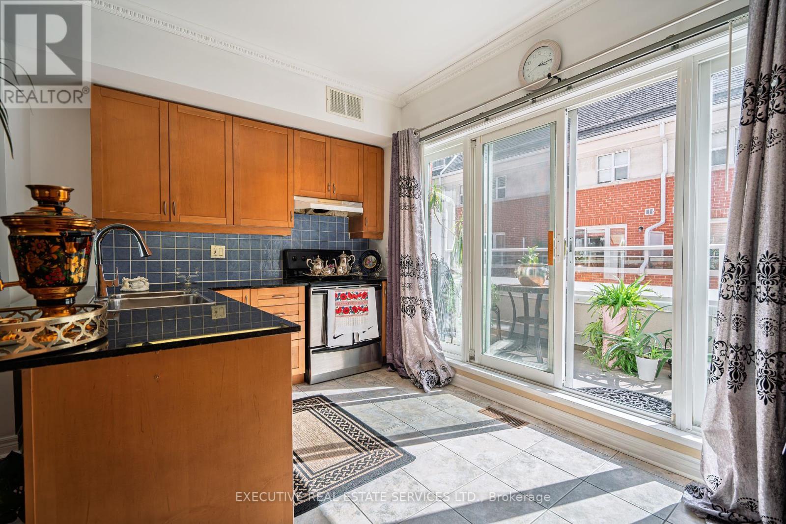 24 Michael Power Place, Toronto, ON - Indoor Photo Showing Kitchen