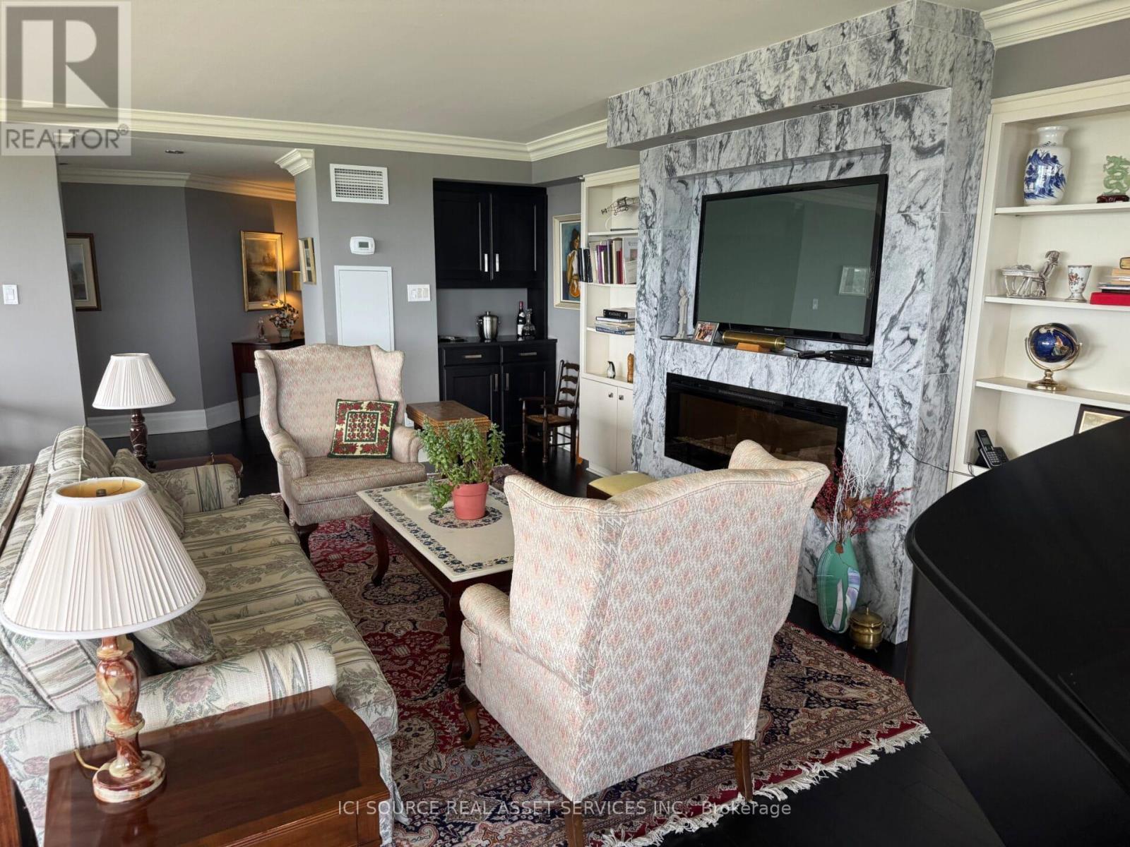 2703 - 2045 Lake Shore Boulevard W, Toronto, ON - Indoor Photo Showing Living Room With Fireplace